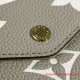 M69977 Félicie Pochette Monogram Empreinte Leather (Dove/Cream)
