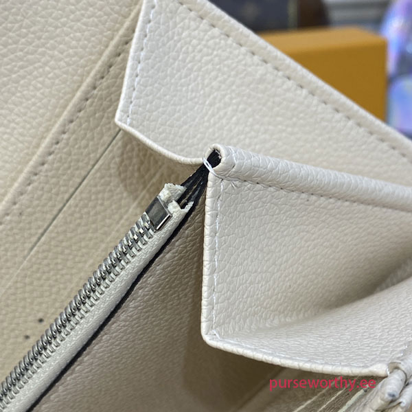 Louis Vuitton M60177 Iris Wallet Mahina Ivory