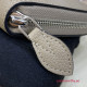M69821 Zippy Wallet Mahina Leather (Galet)